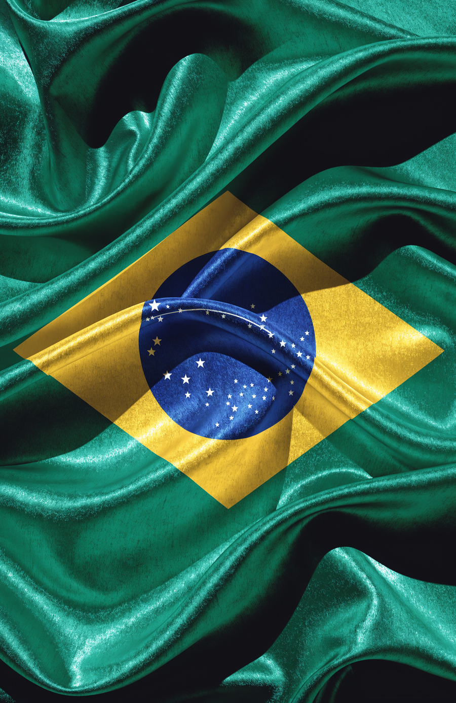 The Brazilian flag moves in emerald satin, the yellow diamond and blue celestial globe set deep in the folds