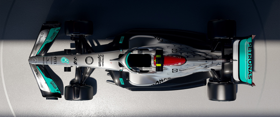 Formula 1 – Silver from Above - a Formula 1 car in silver and teal top-down, Mercedes livery, shot against a clean studio, on a metal wall art plate