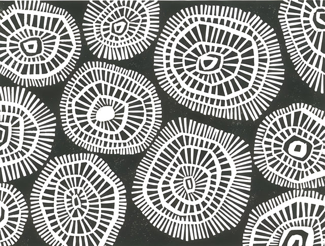 Circle Print - white circular motifs stamped across charcoal, each one slightly different, on a metal wall art plate