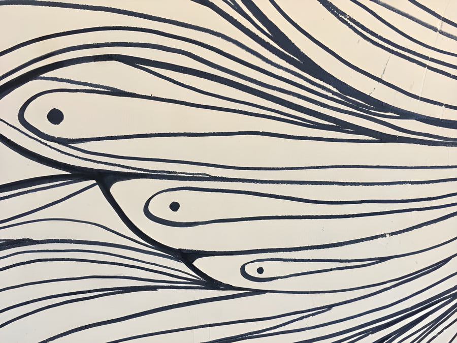 Fish Lines - fish carried along in a current of fine navy lines on cream, on a metal wall art plate