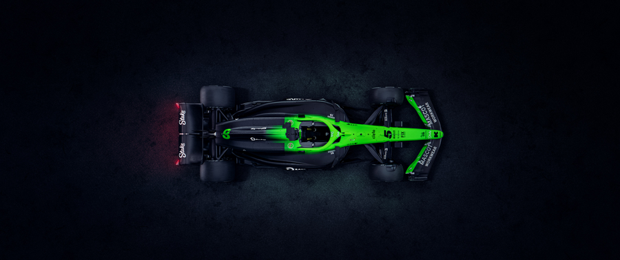 Formula 1 – Black and Green from Above - a Formula 1 car in black and green, shot against a clean studio ground, on a metal wall art plate