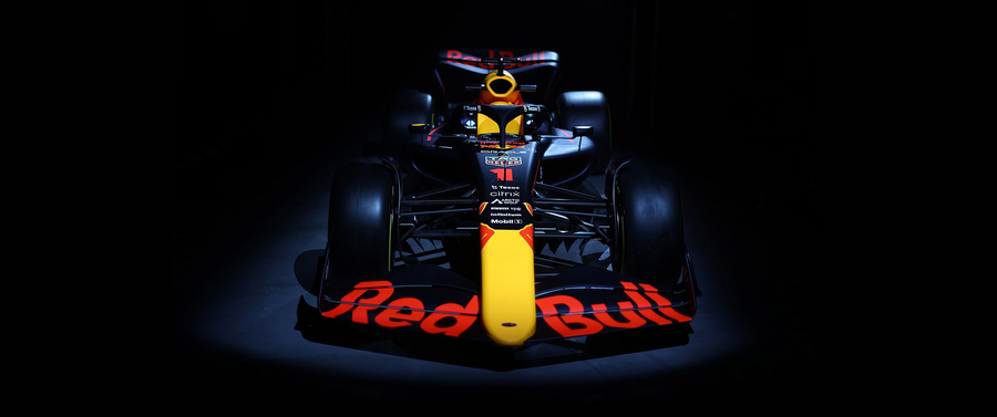 Formula 1 – Head On in the Dark - a Formula 1 car in Red Bull livery, shot against a clean studio ground, on a metal wall art plate