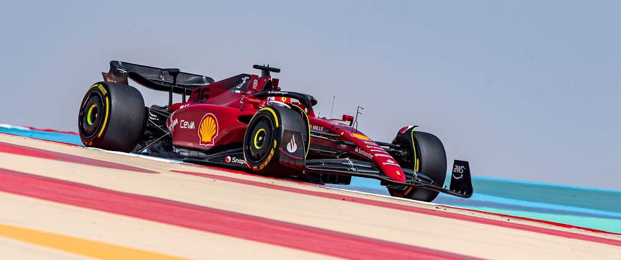 Formula 1 – Scarlet on the Kerbs - a Formula 1 car in red on track kerbs, Ferrari livery, shot against a clean studio ground, on a metal wall art plate