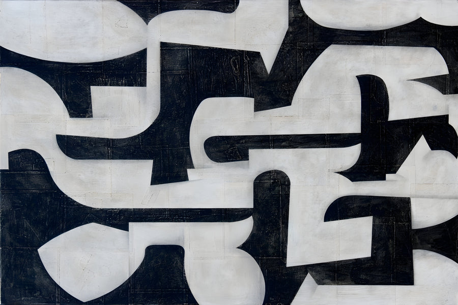 Interlock - black and white shapes cut to fit one another, edge to edge, on a metal wall art plate