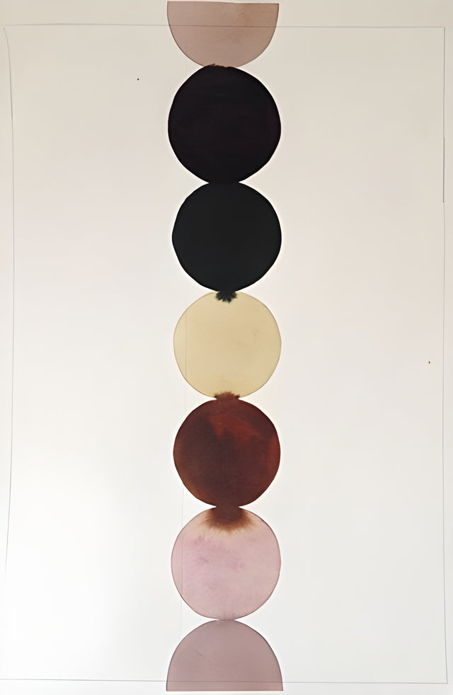 Stacked Circles - circles stacked one on another in black, cream, oxblood and dusty pink, on a metal wall art plate
